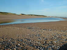 charco en la playa el chiringo